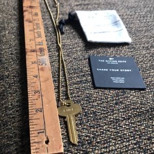 The Giving Keys “Fire” necklace.